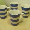 A set of 4 TG Green Blue and White Cornishware Mugs