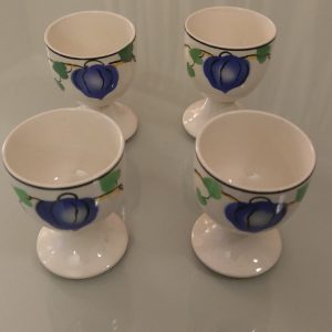 TG Green Physalis Footed Egg cups x 4. All are in great condition stand 6.25cm tall